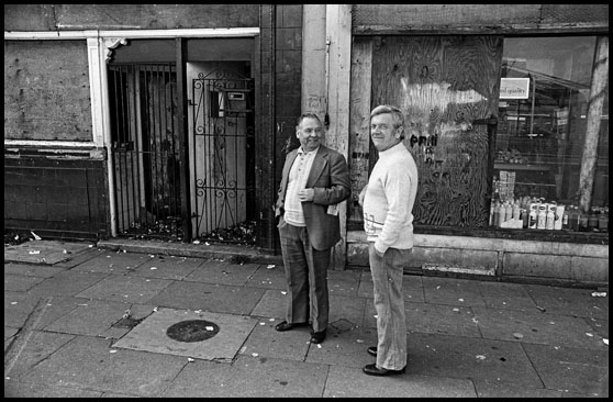 two men outside spensos